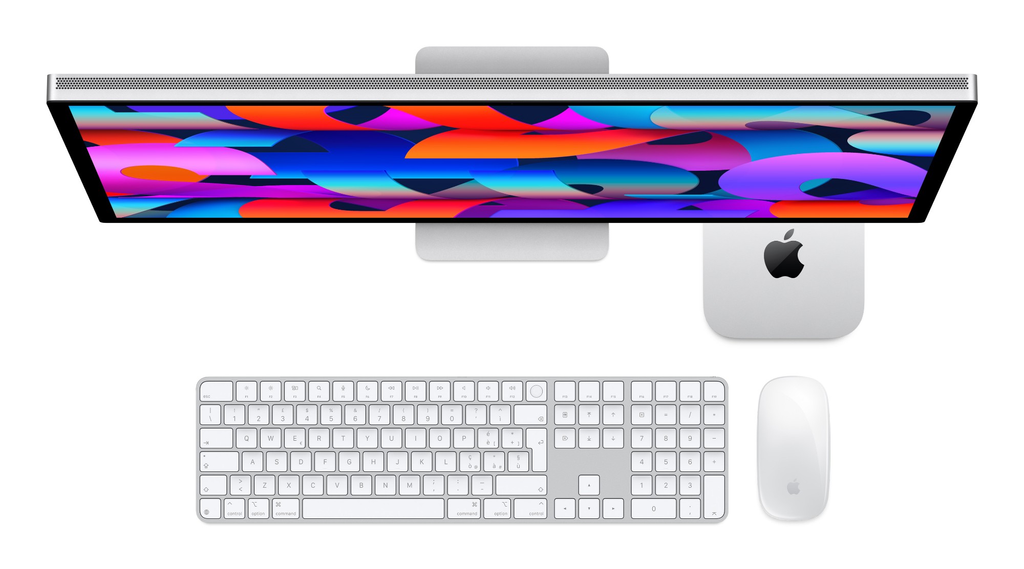 Mac mini M4 desk setup from above — Apple Studio Display, Magic Keyboard with Touch ID and Magic Mouse