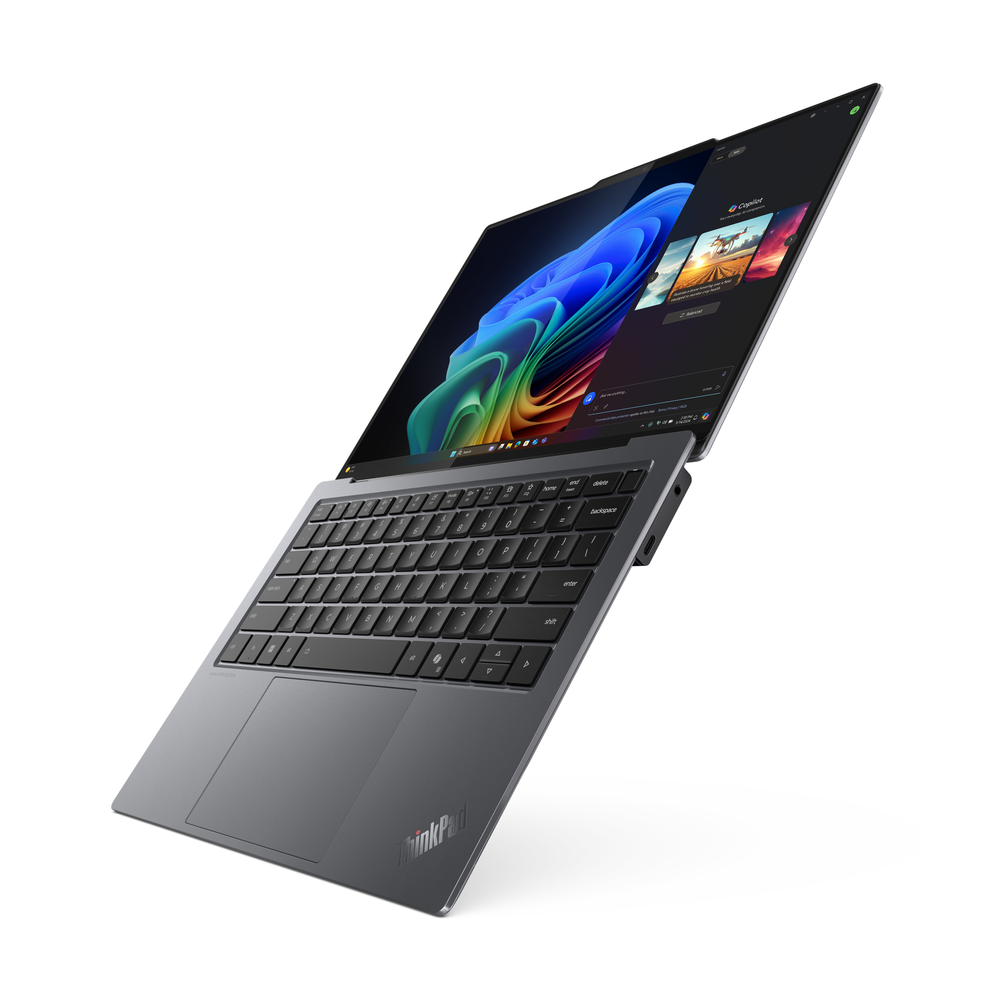 Lenovo ThinkPad X9-14 Aura Edition — angled view showing the Engine Hub, haptic touchpad and backlit keyboard