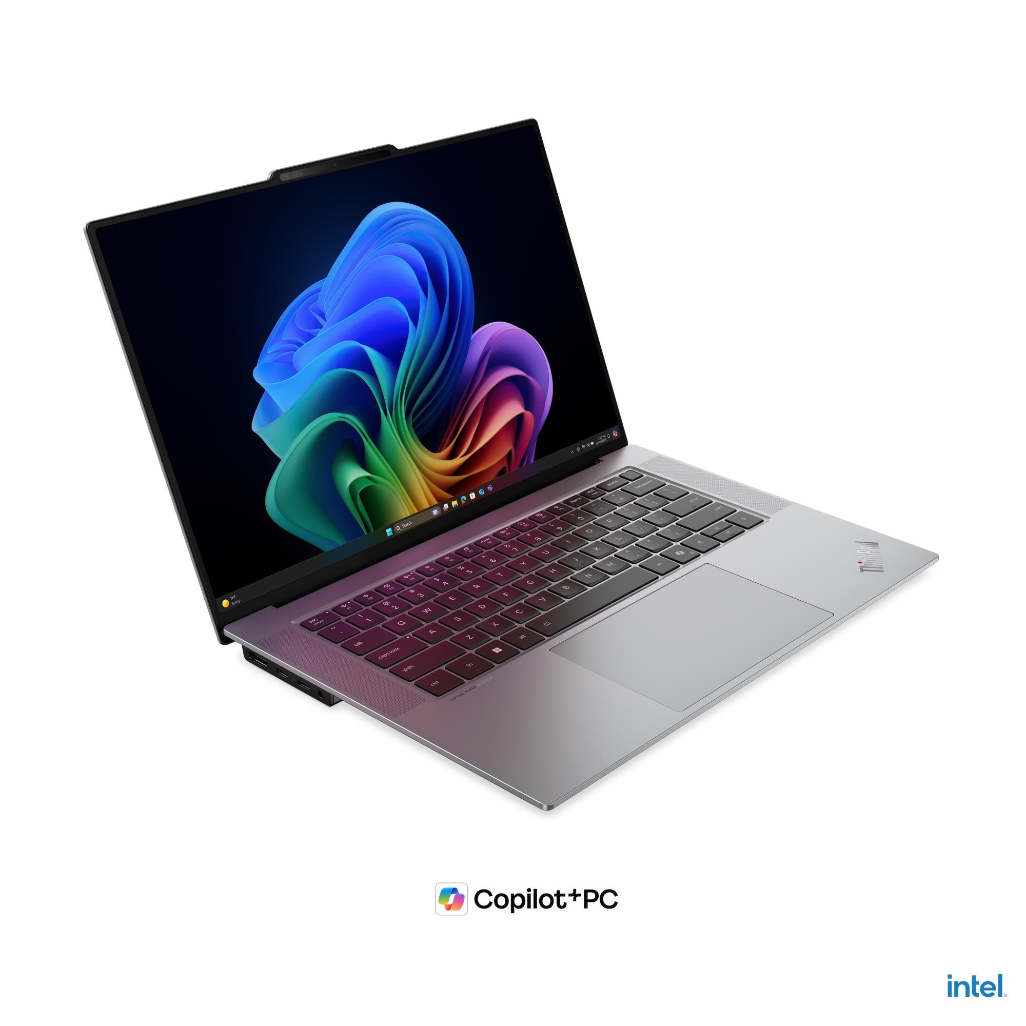 Lenovo ThinkPad X9-15p Gen 1 Aura Edition — angled view showing the backlit keyboard and glass haptic touchpad